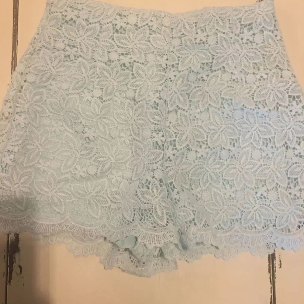 Charlotte Russe medium run small blue lace shorts